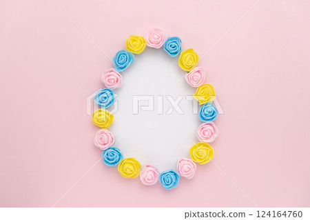 Rosebuds egg shape on pink background 124164760