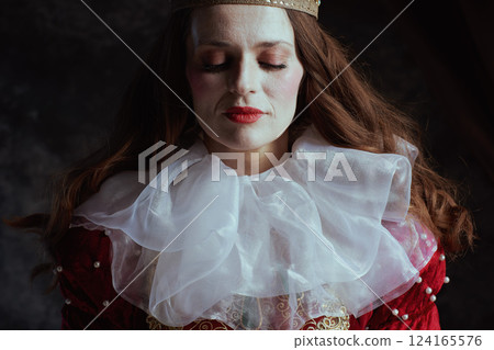medieval queen in red dress with white collar medieval queen in red dress with white collar 124165576