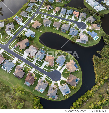 Aerial view of private homes in Florida residential area. New family houses as example of real estate development in American suburbs 124166071