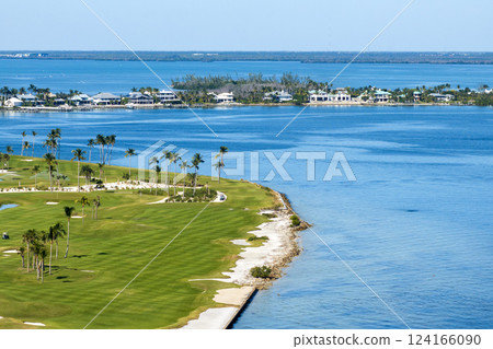Aerial view of large golf field with green grass in Boca Grande, small town on Gasparilla Island in southwest Florida. Outdoor activities for wealthy people 124166090