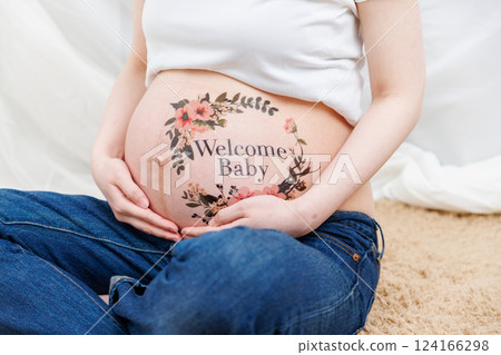 Pregnancy, due date, maternity photo, body paint 124166298