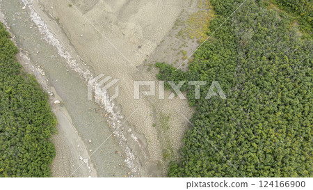 Arda Riverbed running dry during severe drought affecting rainforest in Piacenza, Italy 124166900