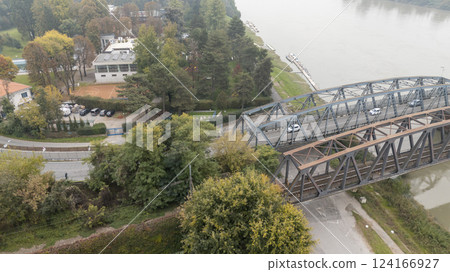 Aerial view of the iron bridges crossing po river in cremona Aerial view of the iron bridges crossing po river in cremona 124166927
