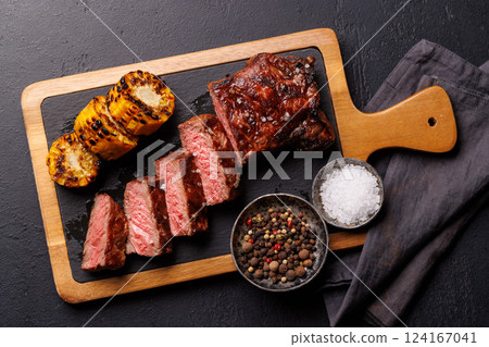 A perfectly cooked sliced striploin steak with a juicy, tender texture 124167041