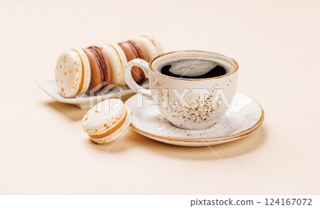 A delightful combination of freshly brewed coffee and delicate macaroons 124167072