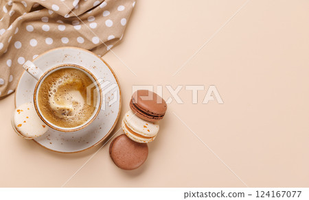 A delightful combination of freshly brewed coffee and delicate macaroons 124167077