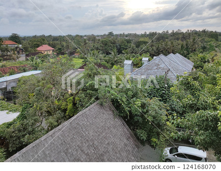 Traditional Balinese huts, hotel, guesthouse in the jungle in Ubud area, Bali Traditional Balinese huts, hotel, guesthouse in the jungle in Ubud area, Bali 124168070