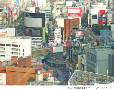 Tokyo cityscape. In front of Shinjuku Station. Illustrated photo. Tokyo cityscape. In front of Shinjuku Station. Illustrated photo. 124168397