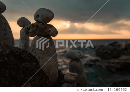 Rocks, Sunset, Sea: Stone stacks at dusk by the ocean. 124169562