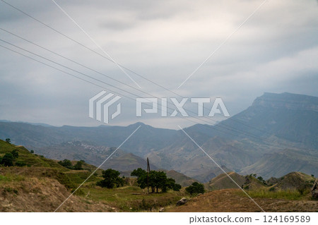 Caucasian mountain. Dagestan. Trees, rocks, mountains, view of the green mountains. Beautiful summer landscape. 124169589