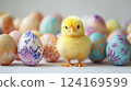 cute little chicken next to painted eggs, easter, bird, farm, holiday, domestic animal, ornithology, avian, chick 124169599