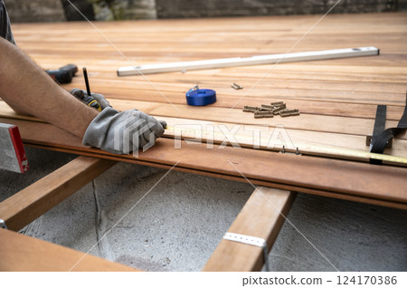 Wooden deck construction in progress Wooden deck construction in progress 124170386