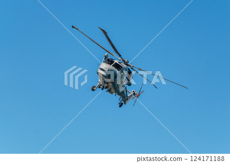 Military helicopter in sky 124171188