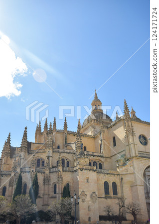 Gothic Cathedral of Segovia with pinnacles and architraves and lobed arches 124171724