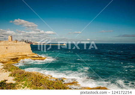 Coastal Fortress Overlooking the Blue Sea in Malta 124172254