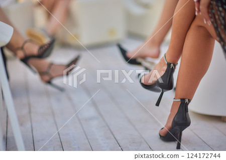 style. fashion. shoes. high women's black boots. beautiful female legs. 124172744