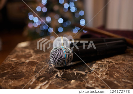 Professional microphones on a marble surface designed for recording and audio Professional microphones on a marble surface designed for recording and audio 124172778