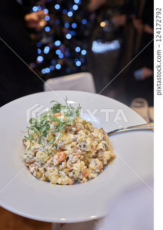 An elegant pasta dish expertly served at a fine dining restaurant, offering a unique experience An elegant pasta dish expertly served at a fine dining restaurant, offering a unique experience 124172792