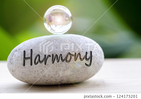 Close up of Zen stone with Harmony text on the stone 124173201
