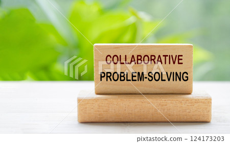 Collaborative Problem Solving text on wooden block with blurred nature background. Teamwork and collaboration concept 124173203