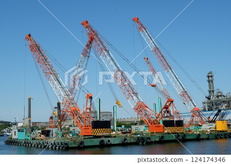 A barge with a crane moored on the Chidori Canal 124174346
