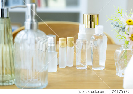 Cosmetic bottles on a table (no people) Cosmetic bottles on a table (no people) 124175522