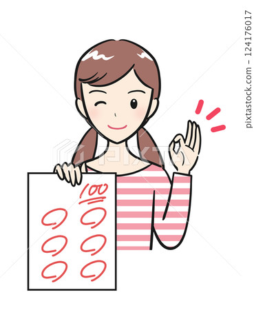 A smiling elementary school girl shows off the test she got 100 points on A smiling elementary school girl shows off the test she got 100 points on 124176017