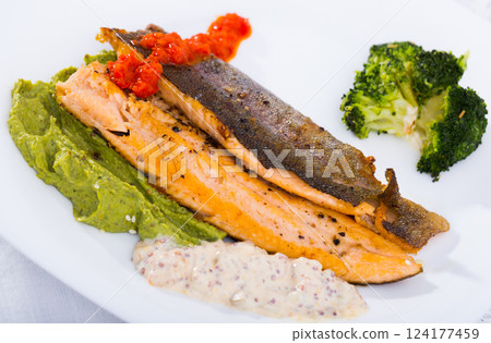 Grilled trout with broccoli and tartar Grilled trout with broccoli and tartar 124177459