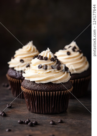 A collection of beautifully decorated cupcakes in various styles, perfect for dessert and celebration themes 124177644