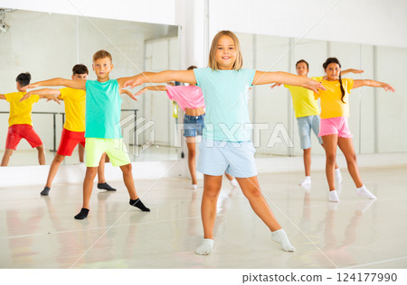 Happy kids having fun in choreography studio during dance lesson Happy kids having fun in choreography studio during dance lesson 124177990