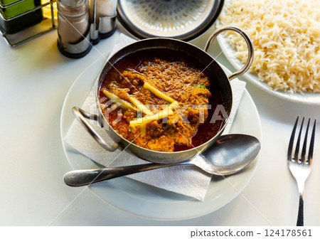 Traditional Indian lamb karahi curry white ginger and rice Traditional Indian lamb karahi curry white ginger and rice 124178561