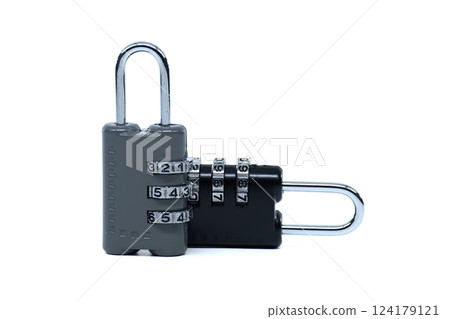 Two combination locks, one gray and one black, offer security and peace of mind. Two combination locks, one gray and one black, offer security and peace of mind. 124179121