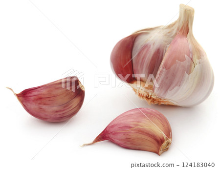 Garlic over white background Garlic over white background 124183040
