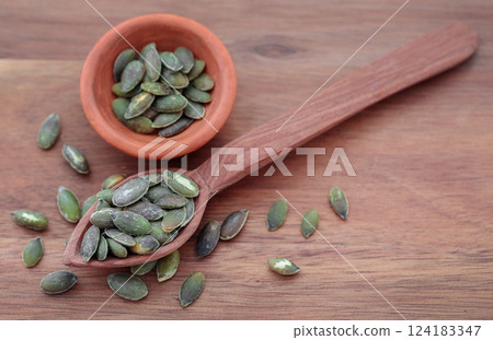 Pumpkin seeds roasted and salty Pumpkin seeds roasted and salty 124183347