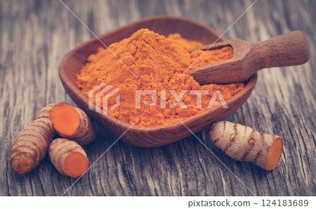 Raw turmeric with powder 124183689