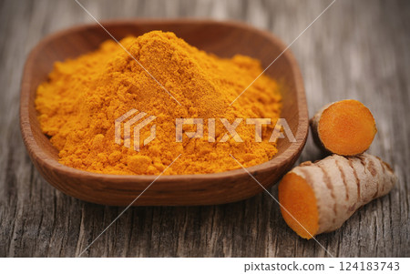 Raw turmeric with powder Raw turmeric with powder 124183743