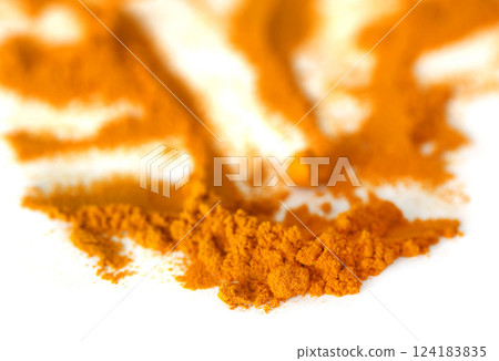 Powdered turmeric 124183835