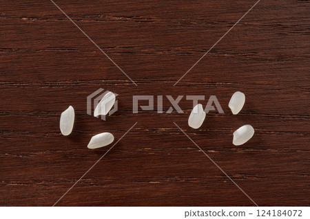Comparison of American rice, Calrose, and Japanese rice. Left: Calrose, Right: Yumepirika Comparison of American rice, Calrose, and Japanese rice. Left: Calrose, Right: Yumepirika 124184072