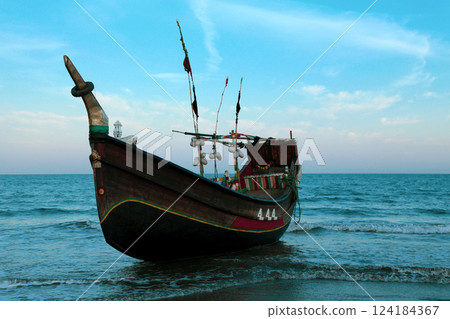 Wooden boat in a Bangladeshi island Wooden boat in a Bangladeshi island 124184367