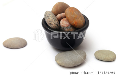 Stone in a bowl Stone in a bowl 124185265