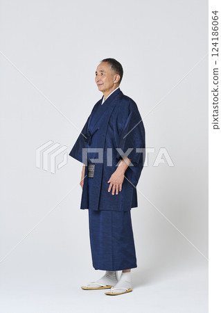 Portrait of a senior man in a navy blue kimono 124186064