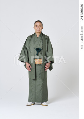 Portrait of a senior man in a green kimono 124186080