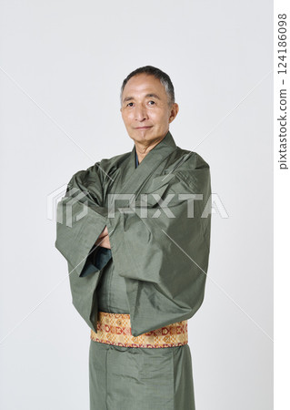 Portrait of a senior man in a green kimono 124186098