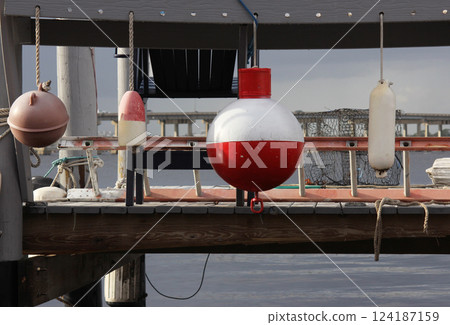 Dock With Chair and Fishing Gear in Bradenton Florida Dock With Chair and Fishing Gear in Bradenton Florida 124187159