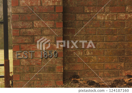 Gate and Sign at Entrance to Historic Larissa Cemetery in Rural East Texas 124187160