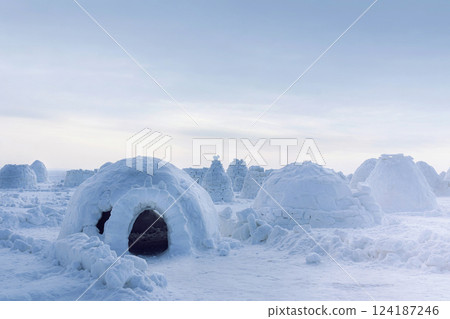 Eskimo home, igloo made of ice and snow. Lots of igloo built. snow winter photo 124187246