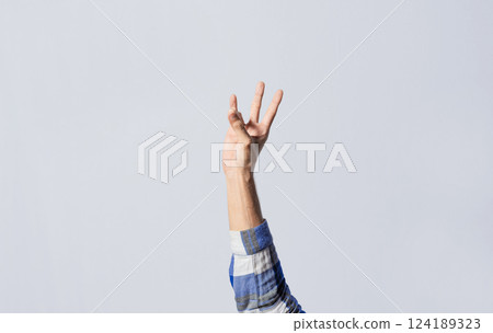 Number SEVEN in sign language. Fingers counting the number SEVEN in sign language, Fingers of people counting number SEVEN in sign language. Concept of numbers in sign language Number SEVEN in sign language. Fingers counting the number SEVEN in sign language, Fingers of people counting number SEVEN in sign language. Concept of numbers in sign language 124189323