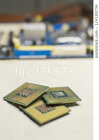 isolated computer microprocessors, three computer processors with one computer motherboard, computer processor concept 124189734