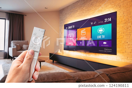 Watching TV, VOD service on TV. 124190811