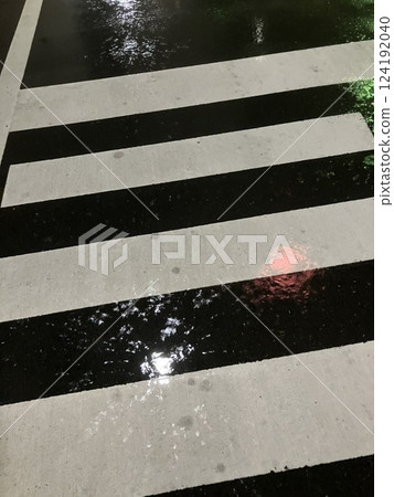 Pedestrian crossing wet in the rain Pedestrian crossing wet in the rain 124192040